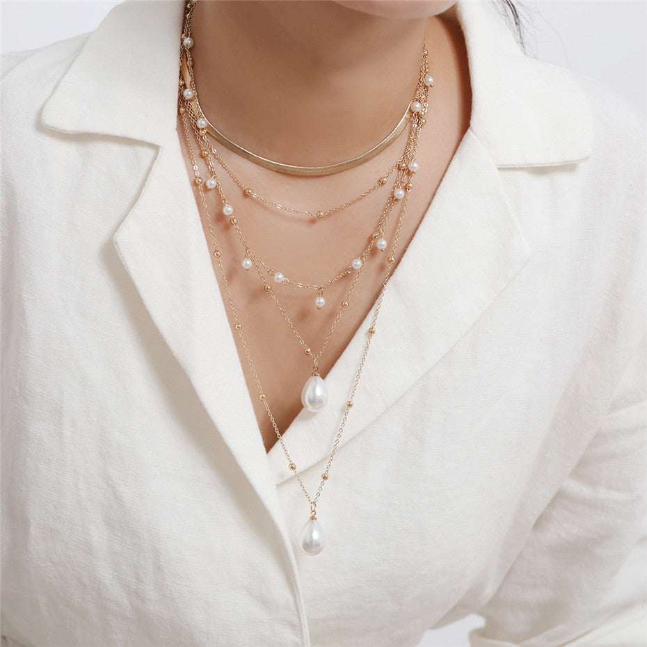 Women’s Gothic Baroque Pearl Tassel Necklace – Multi-Layer Mother-of-Pearl Gold Statement Jewelry