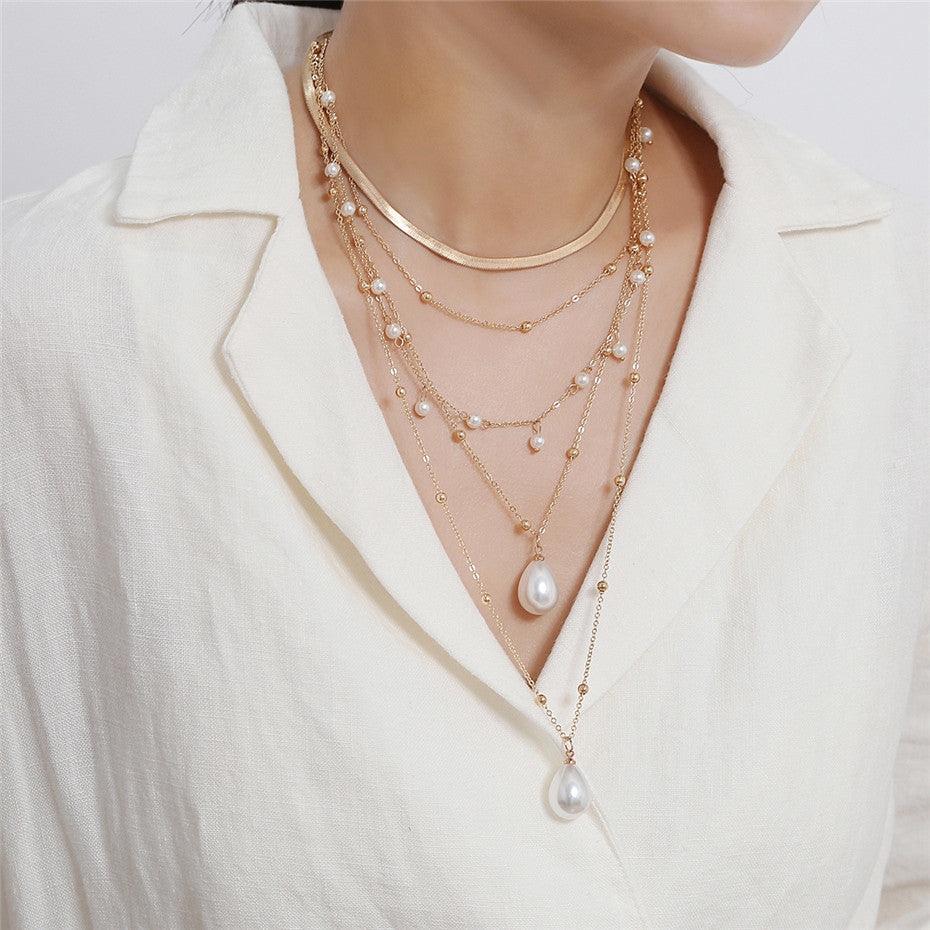 Women’s Gothic Baroque Pearl Tassel Necklace – Multi-Layer Mother-of-Pearl Gold Statement Jewelry